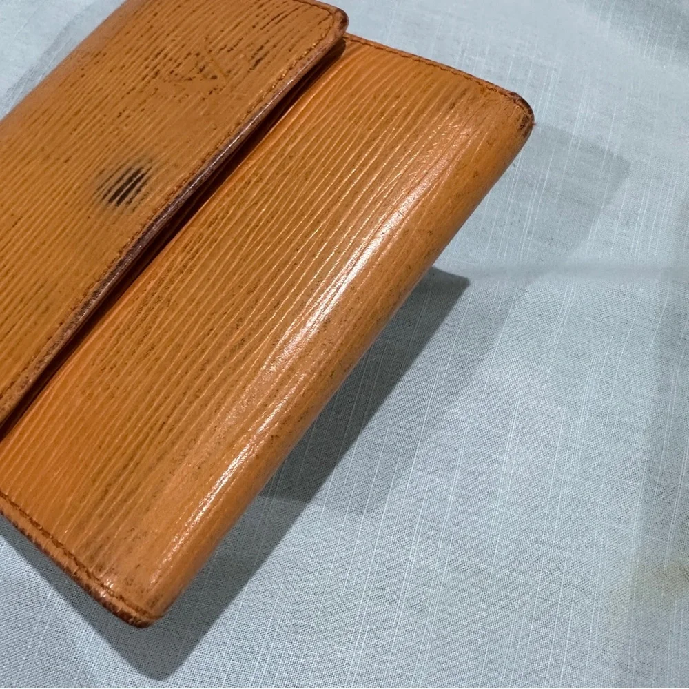 AUTHENTIC Louis Vuitton wallet. Tassel yellow.